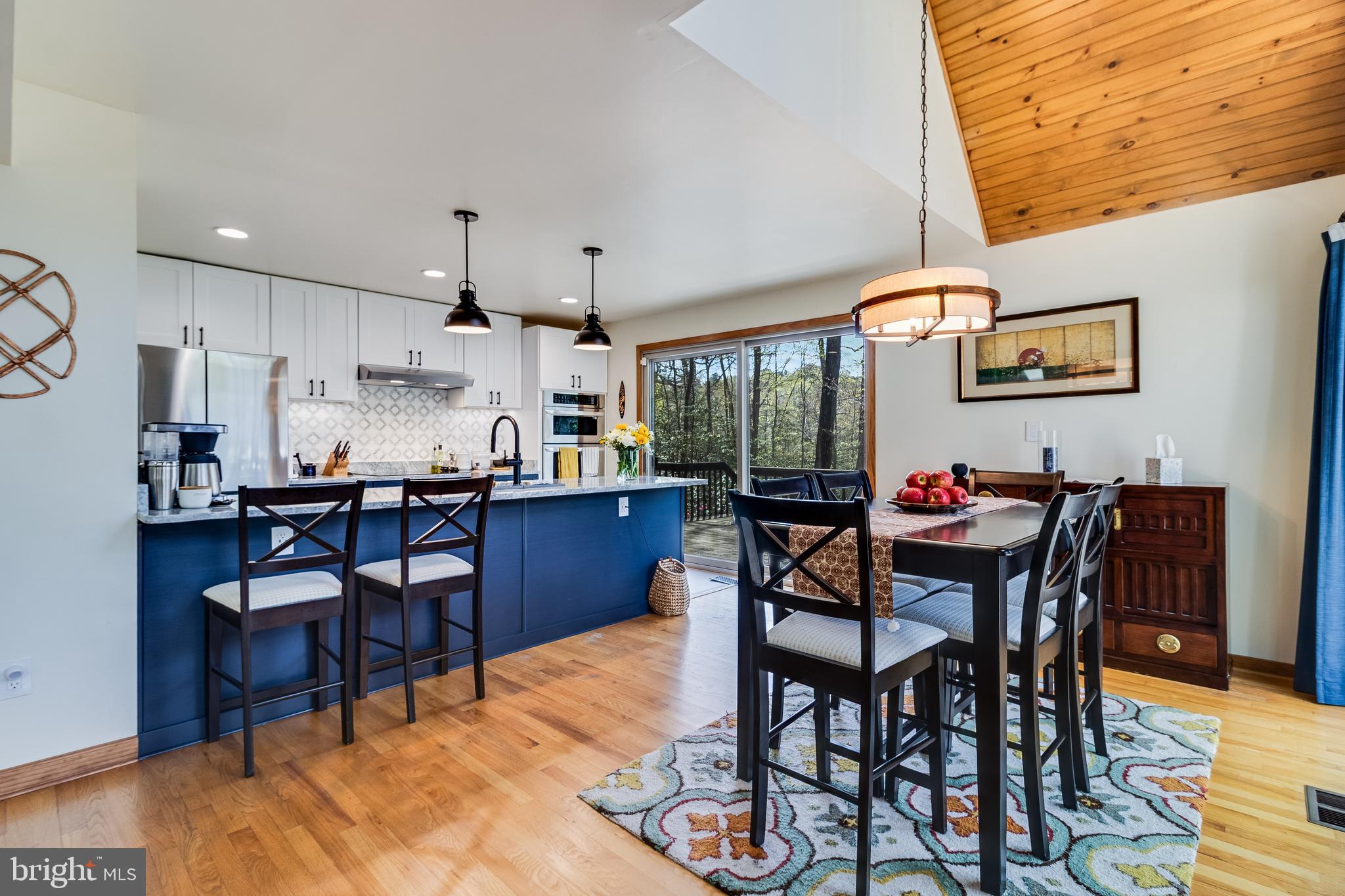 247 Frontier Trail Lusby, MD 20657 - Photo 34 of 62 a view of a dining room with furniture and wooden floor