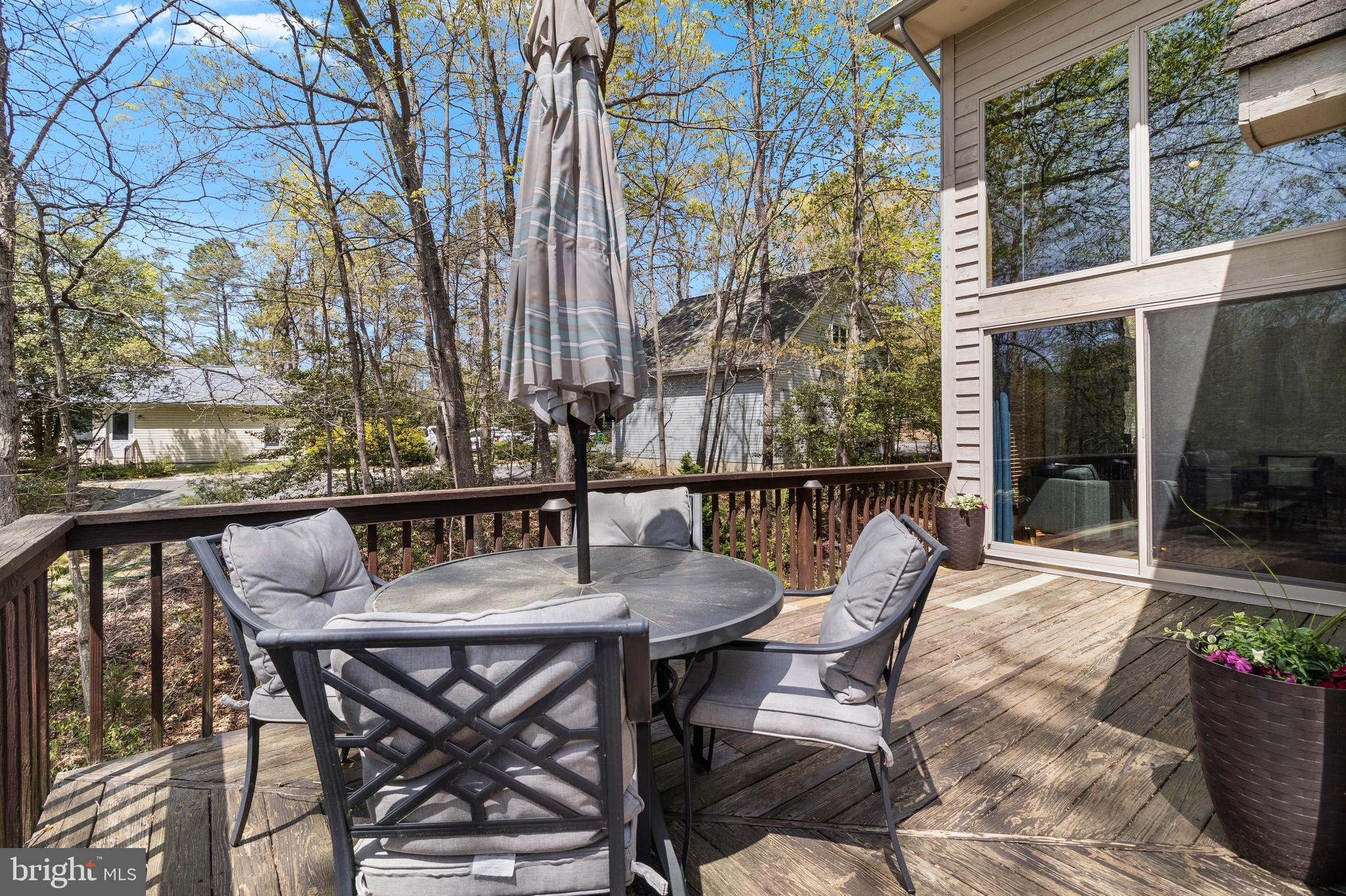 247 Frontier Trail Lusby, MD 20657 - Photo 49 of 62 a view of a chairs and table in the balcony