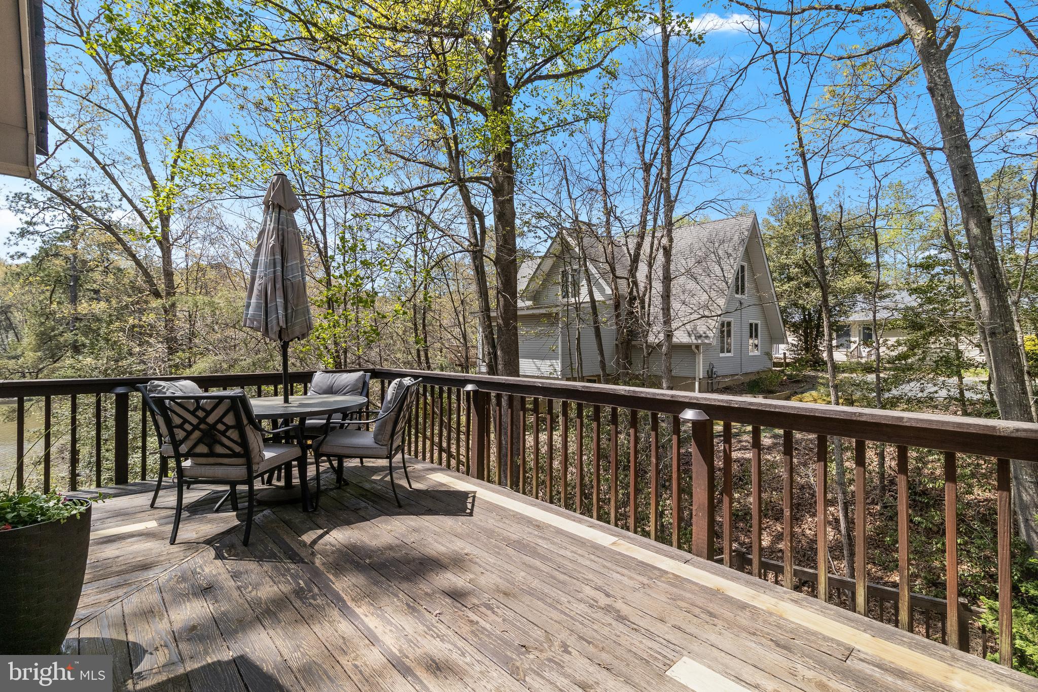 247 Frontier Trail Lusby, MD 20657 - Photo 50 of 62 a view of a two chairs and table in the balcony