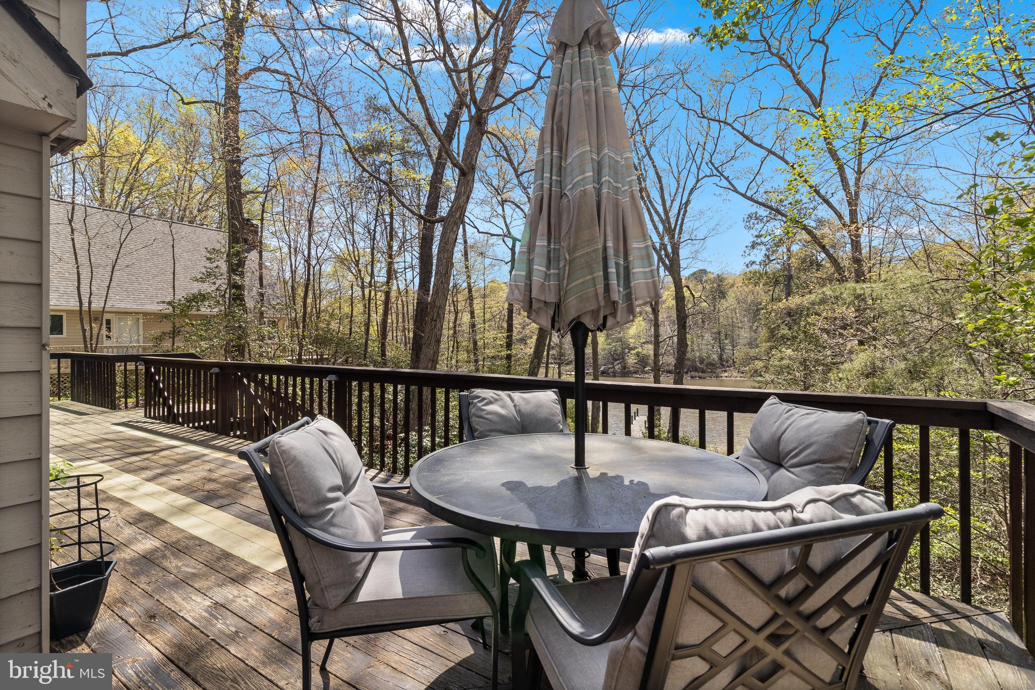 247 Frontier Trail Lusby, MD 20657 - Photo 51 of 62 a view of balcony with table and chairs