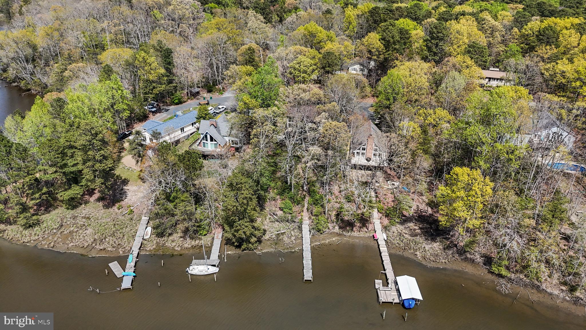 247 Frontier Trail Lusby, MD 20657 - Photo 60 of 62 an aerial view of residential house with parking space