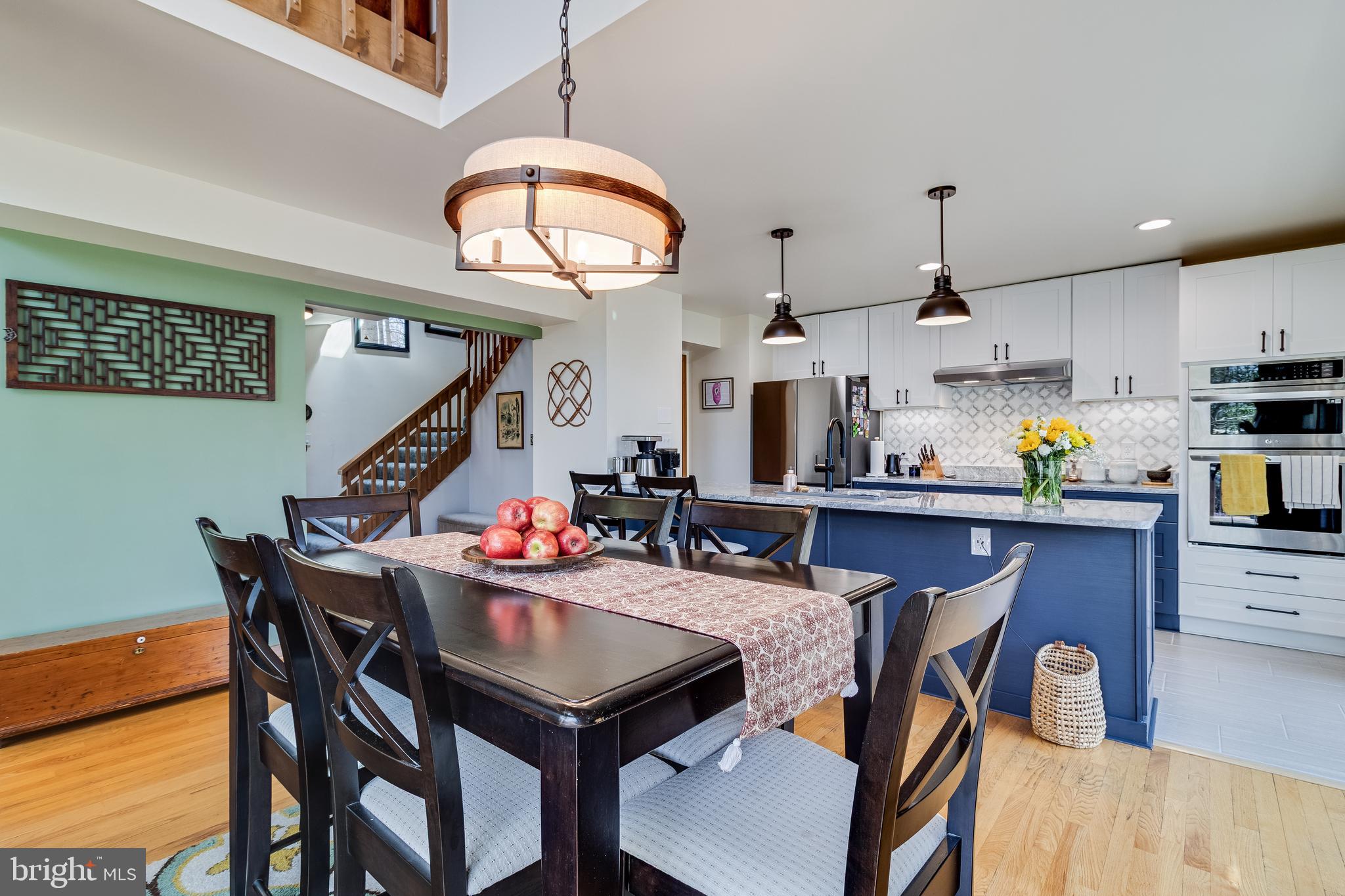 247 Frontier Trail Lusby, MD 20657 - Photo 9 of 62 a view of a dining room and livingroom with furniture