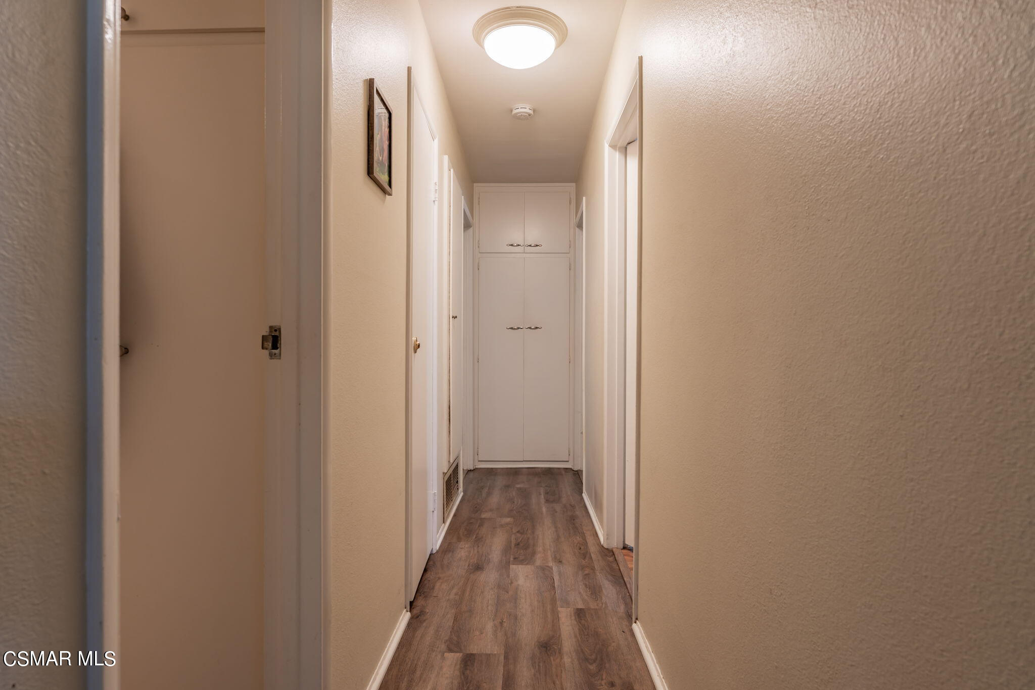 1765 Barnes Street Simi Valley, CA 93063 - Photo 11 of 30 a view of a hallway with wooden floor