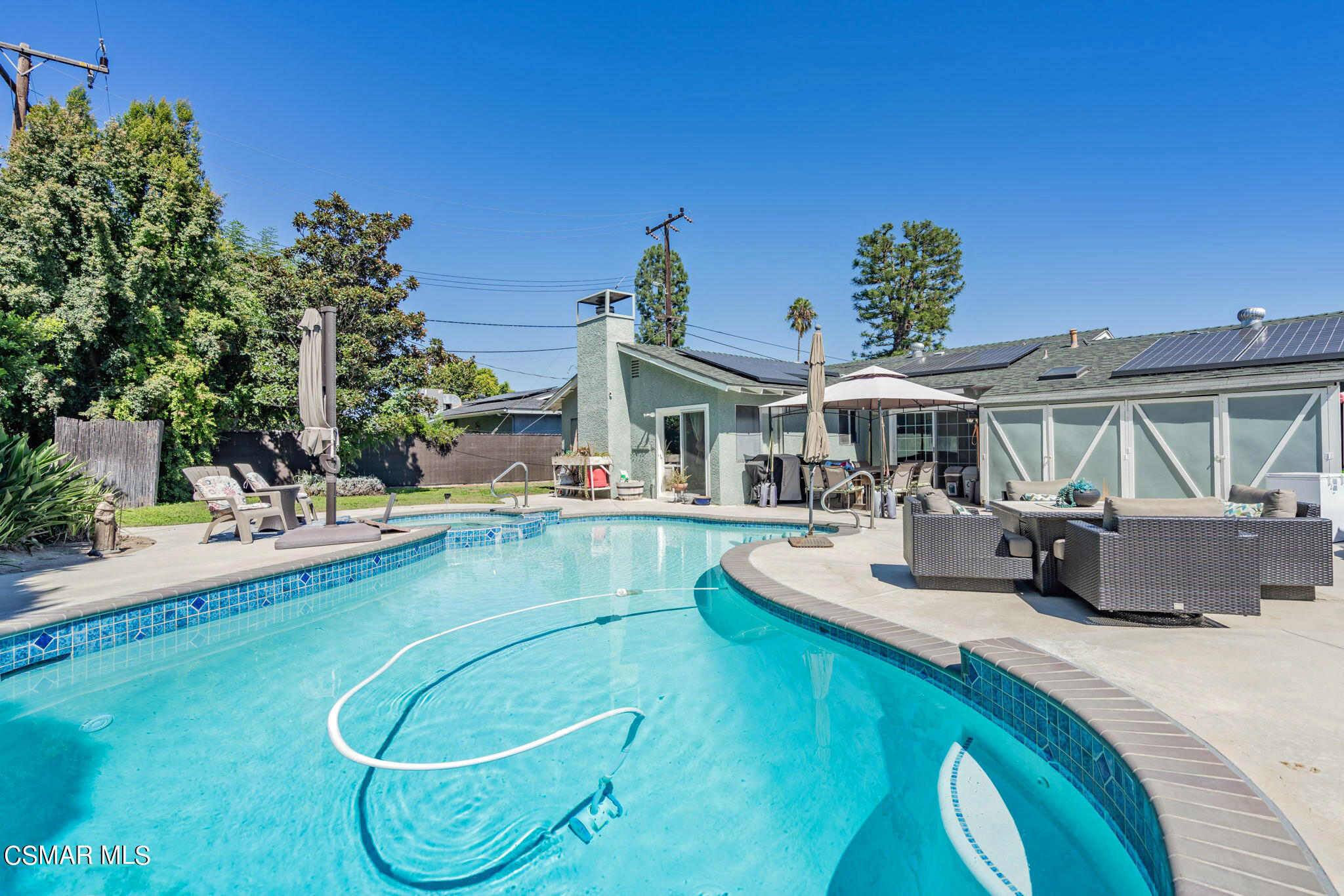 1765 Barnes Street Simi Valley, CA 93063 - Photo 23 of 30 a view of a house with swimming pool and sitting area