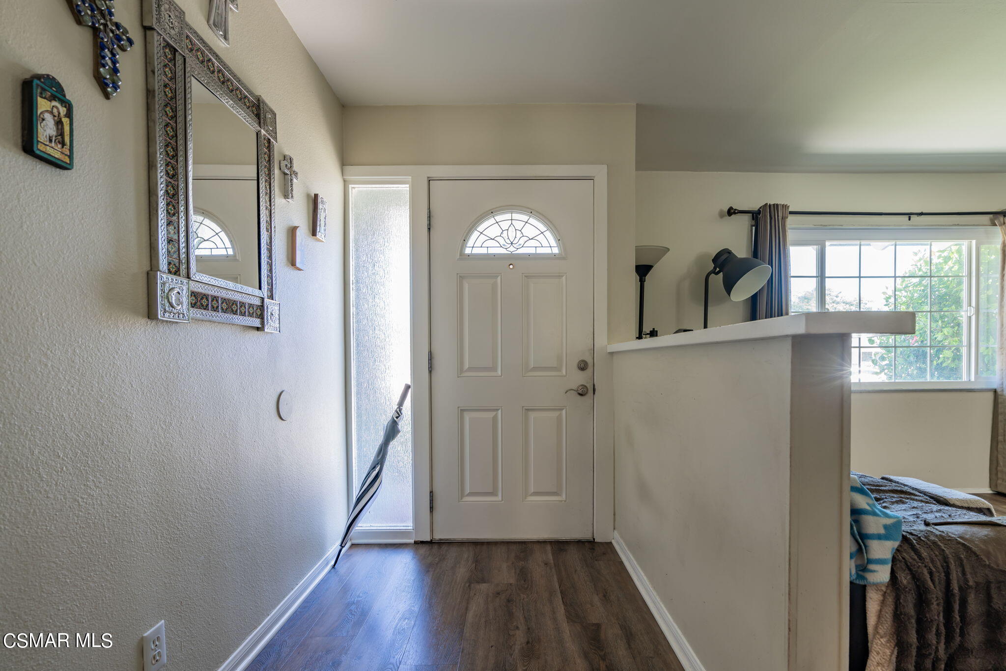 1765 Barnes Street Simi Valley, CA 93063 - Photo 3 of 30 a view of empty room with wooden floor and fan
