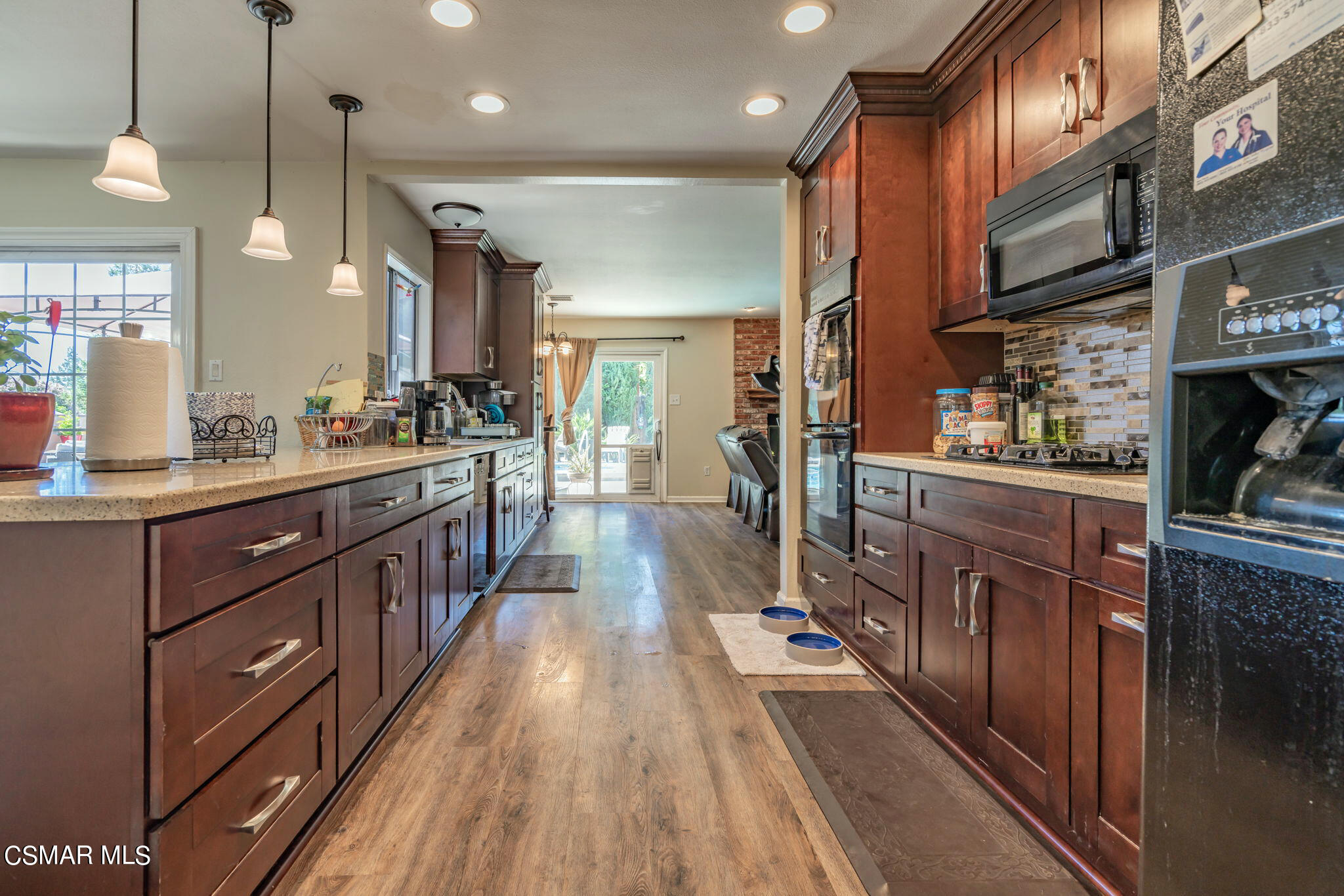 1765 Barnes Street Simi Valley, CA 93063 - Photo 9 of 30 a kitchen with stainless steel appliances granite countertop lots of counter top space
