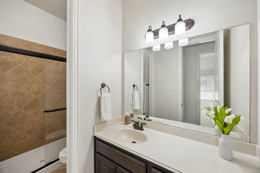 1567 Red Rock Canyon Road Frisco, TX 75036 - Photo 26 of 36 Third bathroom has walk in shower.