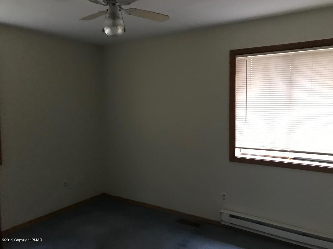 1129 Norfolk Road Tobyhanna, PA 18466 - Photo 2 of 14 an empty room with a window