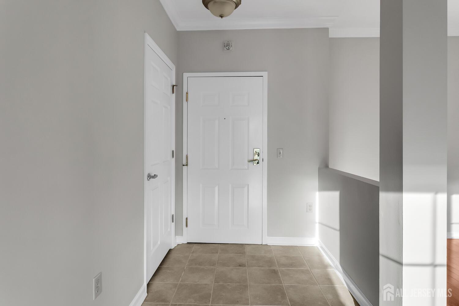 325 Regency Place Woodbridge, NJ 07095 - Photo 8 of 30 a view of a hallway and closet