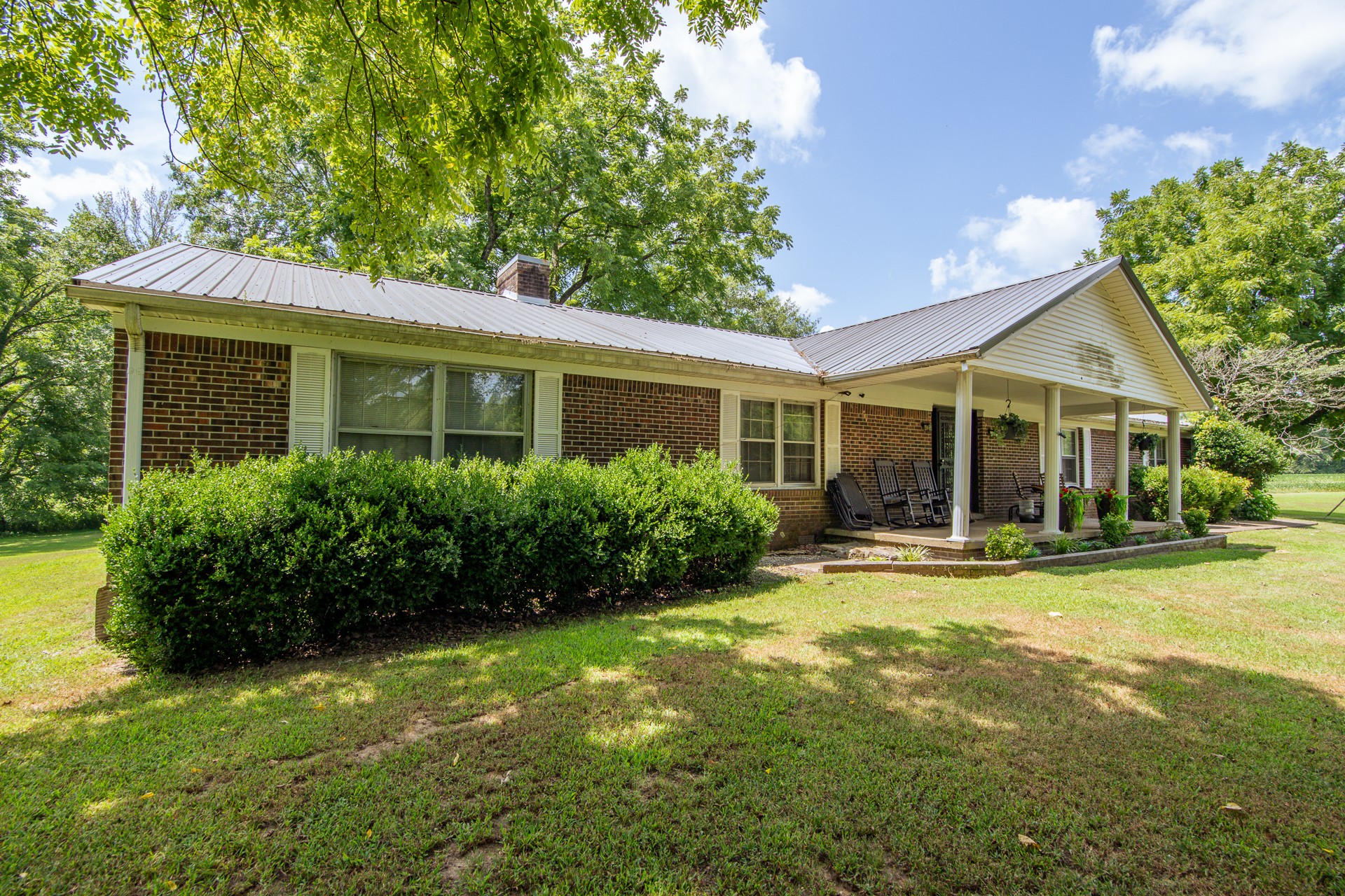 320 Rabbit Ranch Road Henderson, TN 38340 - Photo 9 of 66 a view of a house with a yard and potted plants