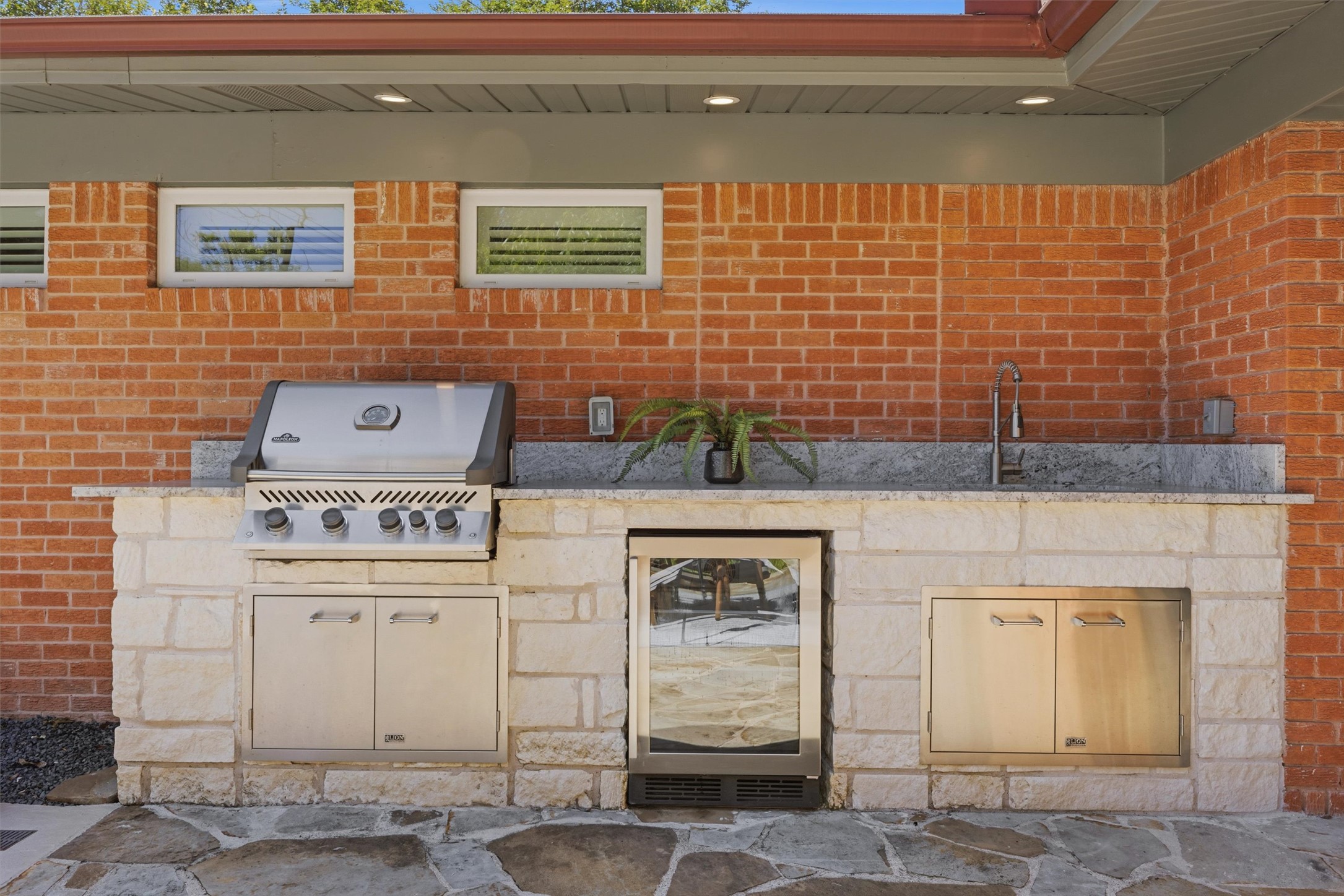 4801 Roundup Trail Austin, TX 78745 - Photo 32 of 40 Outdoor kitchen - natural gas grill, beverage cooler & sink + storage