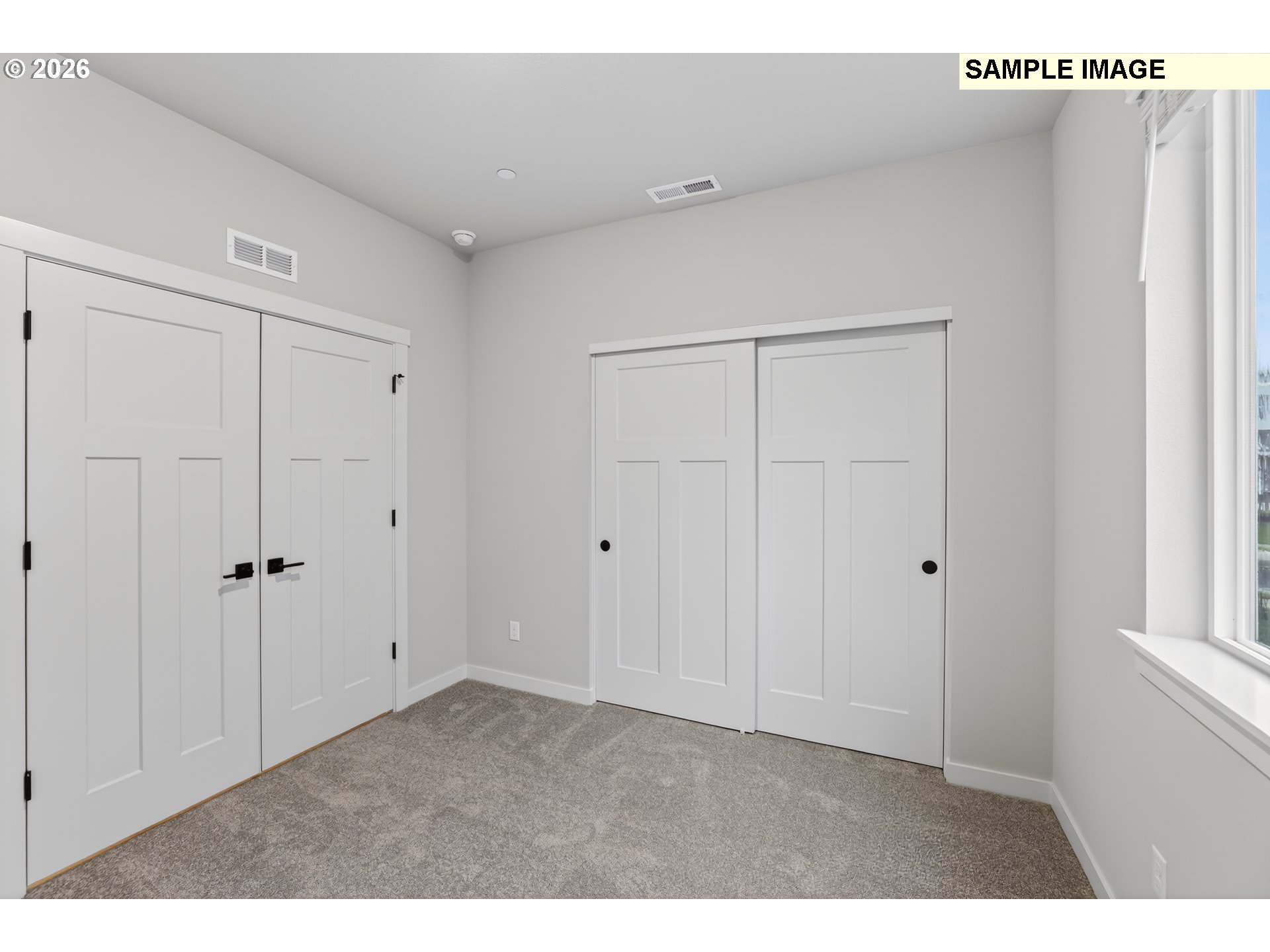 5272 North 87th Avenue Camas, WA 98607 - Photo 14 of 26 a big room with closet and wooden floor