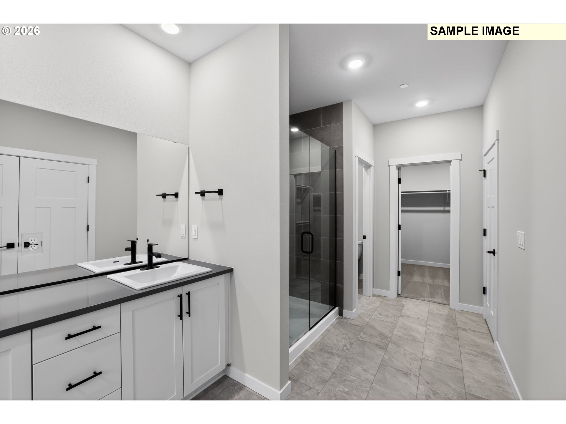 5272 North 87th Avenue Camas, WA 98607 - Photo 19 of 26 a bathroom with a double vanity sink and mirror
