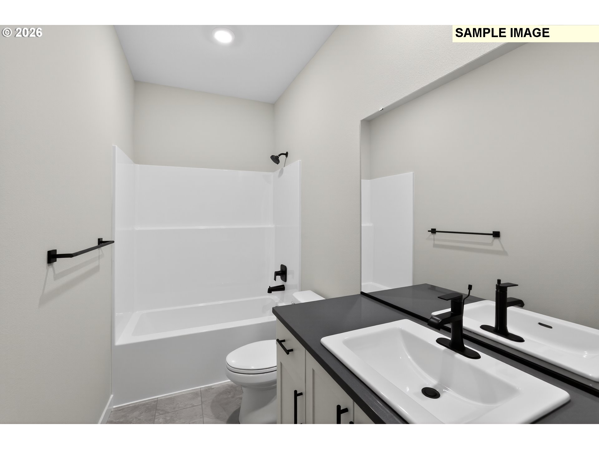 5272 North 87th Avenue Camas, WA 98607 - Photo 20 of 26 a bathroom with a sink a toilet and a mirror