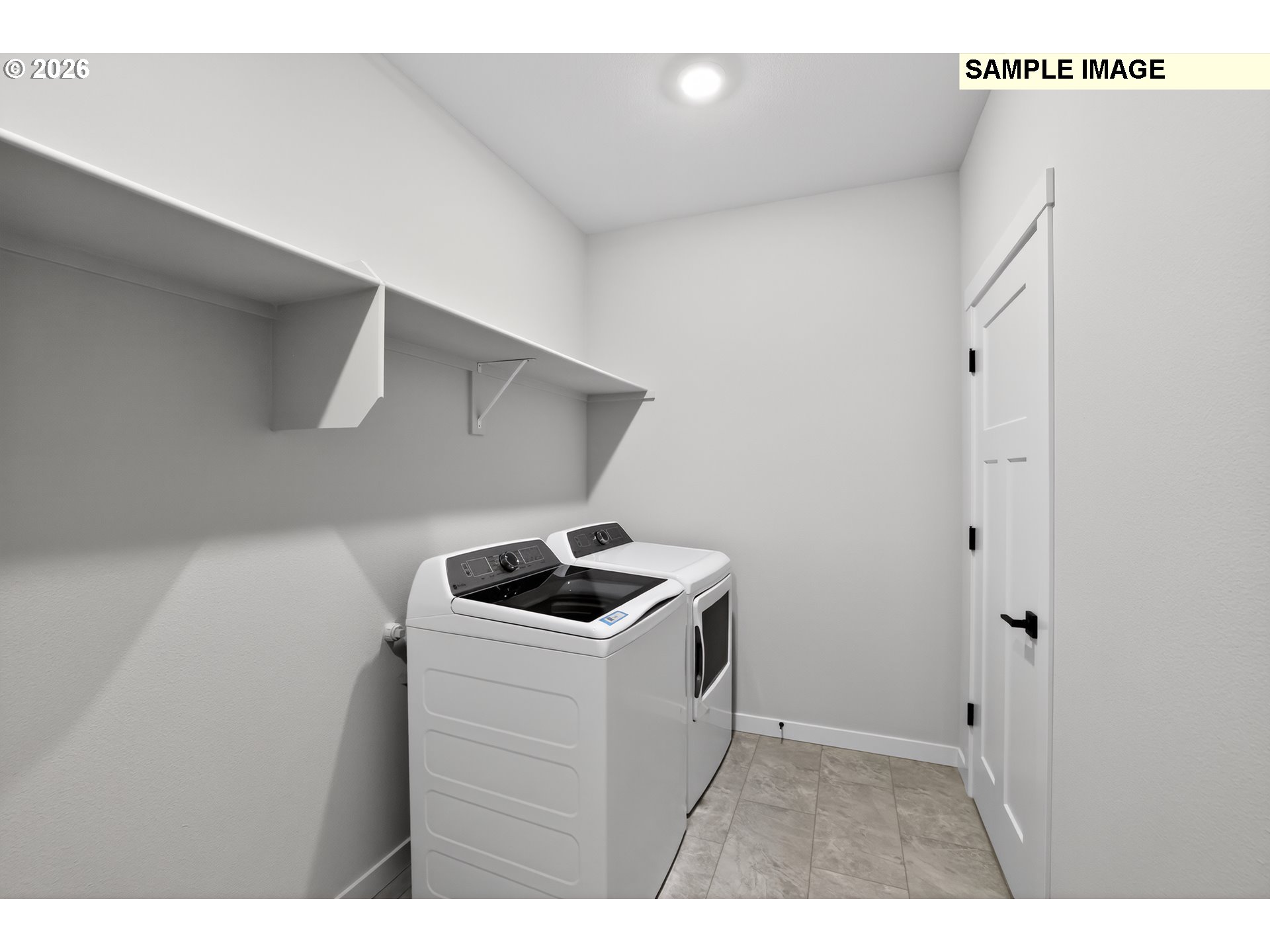 5272 North 87th Avenue Camas, WA 98607 - Photo 23 of 26 a utility room with dryer and washer