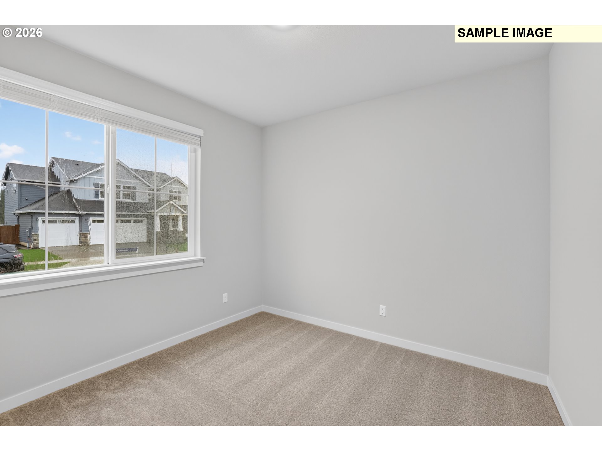 5272 North 87th Avenue Camas, WA 98607 - Photo 5 of 26 a view of an empty room with a window
