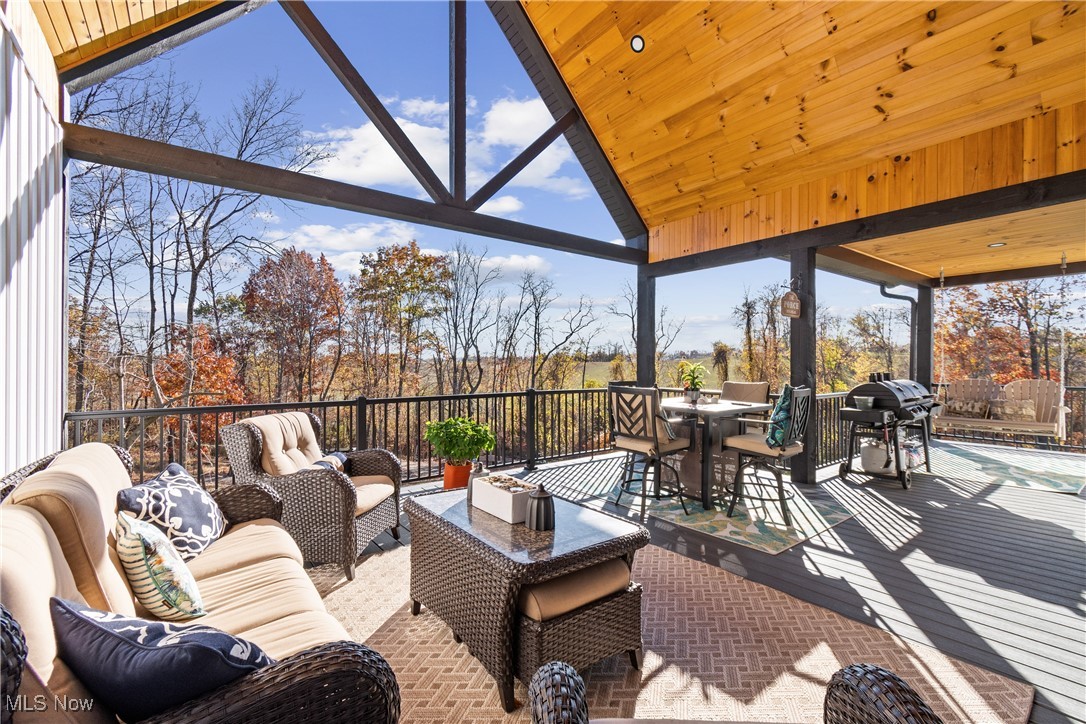 37250 Harry's Ridge Road Barnesville, OH 43713 - Photo 6 of 50 View of patio featuring a grill and an outdoor hangout area