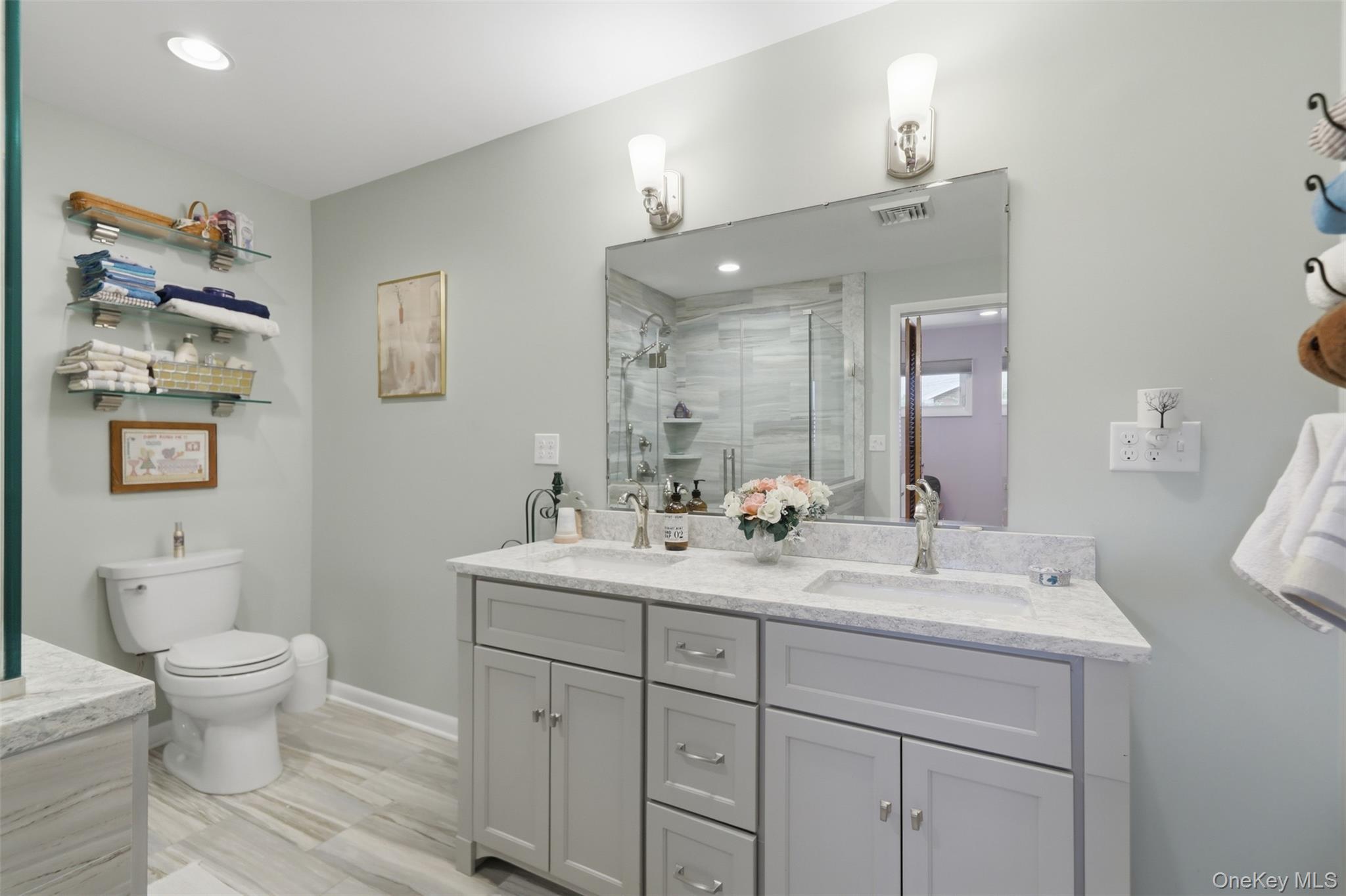 1 Hiko Place Fishkill, NY 12524 - Photo 18 of 41 Double vanity with integrated sinks and brushed nickel faucets set in a light-toned countertop
