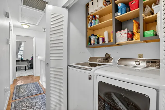 a bedroom with a bed and a table in it