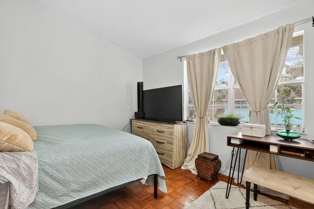 a bathroom with a sink vanity and mirror