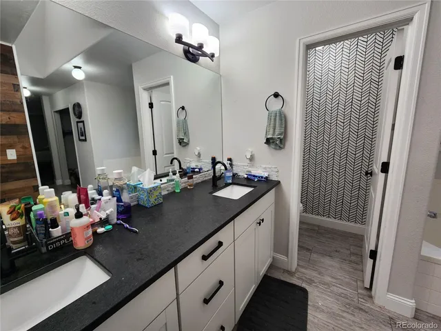 a storage and utility room with washer and dryer