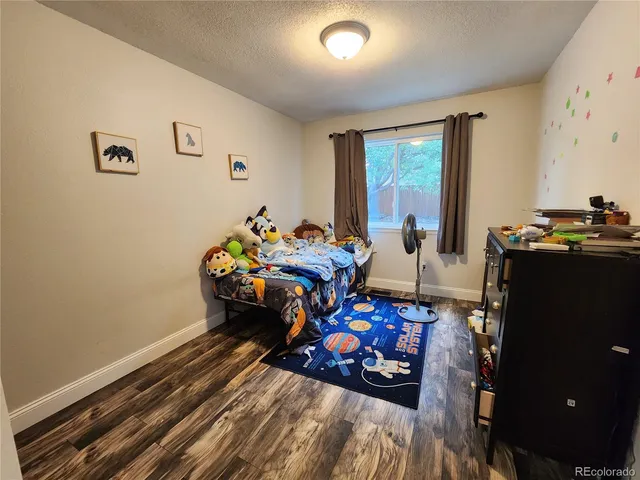 a view of a workspace with furniture