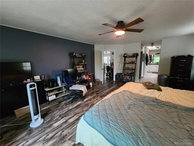 a bed room with a bed and a gym equipment