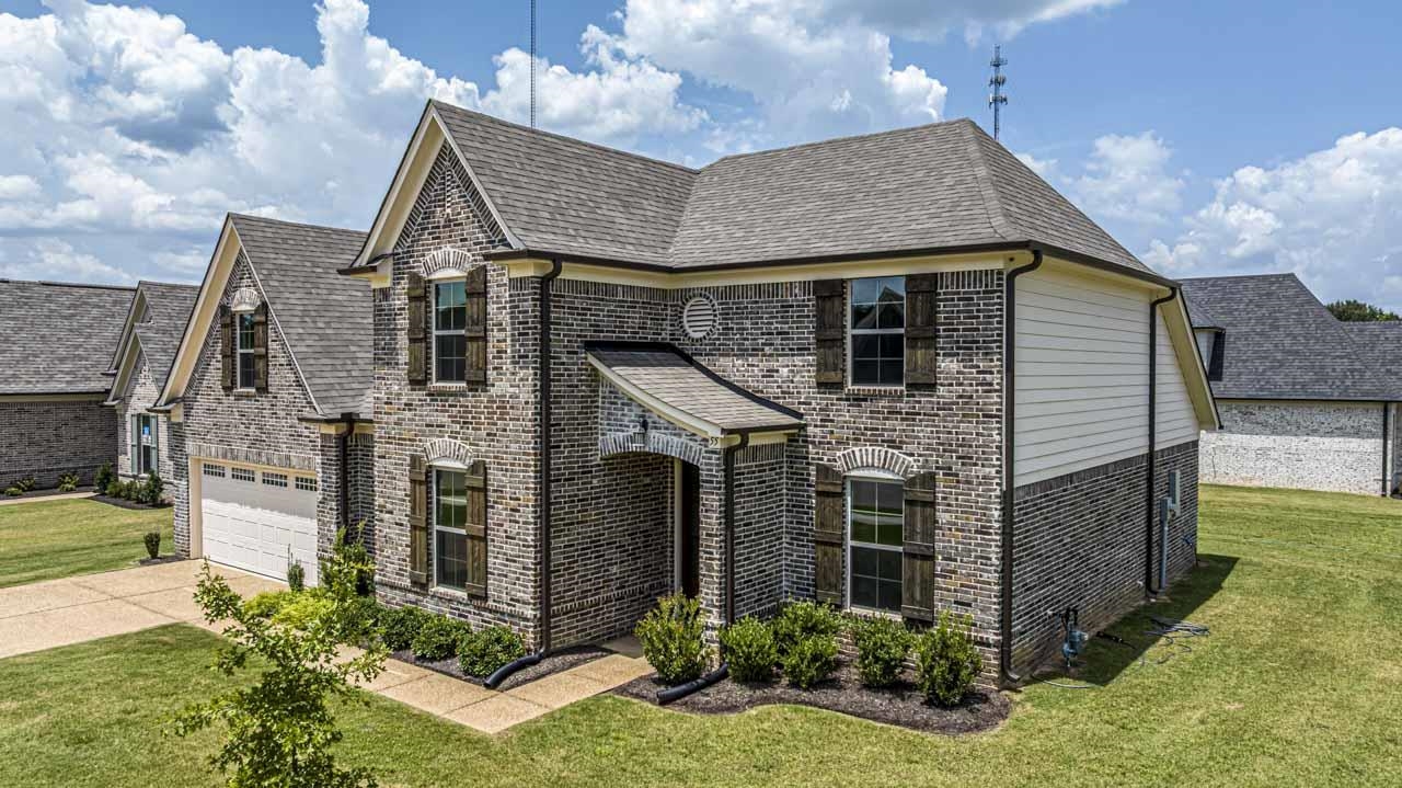 55 Misty Rdg Loop Oakland, TN 38060 - Photo 2 of 38 a front view of a house with garden