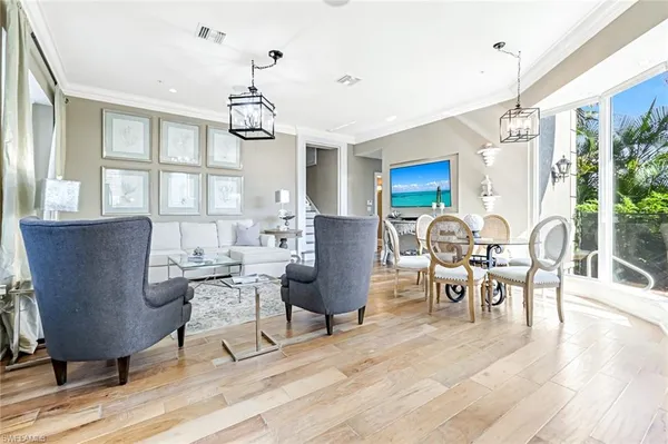 a view of a dining room with furniture window and outside view