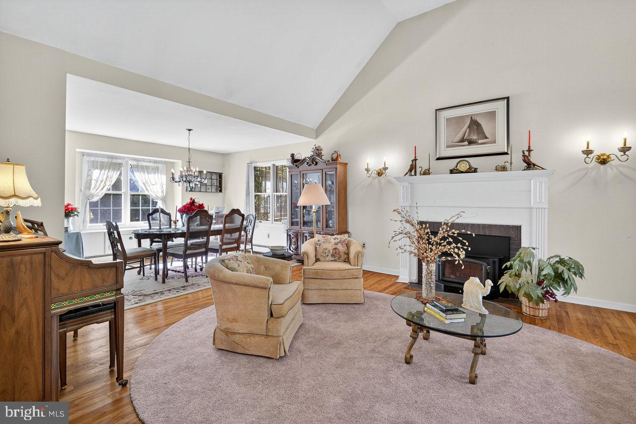 229 Lambertville Headquarters Road Stockton, NJ 08559 - Photo 11 of 44 a living room with furniture a fireplace and a table