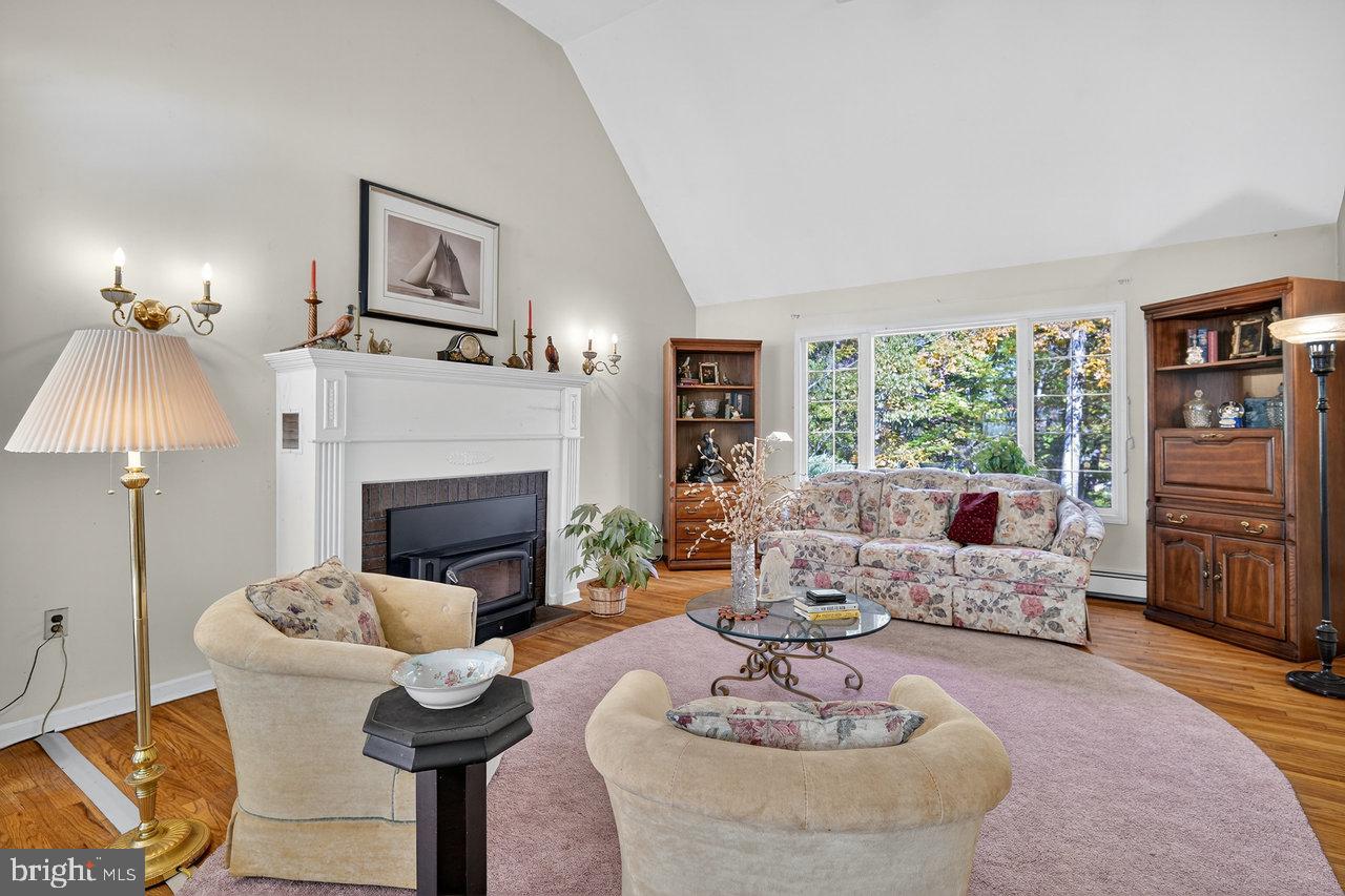 229 Lambertville Headquarters Road Stockton, NJ 08559 - Photo 12 of 44 a living room with furniture and a fireplace