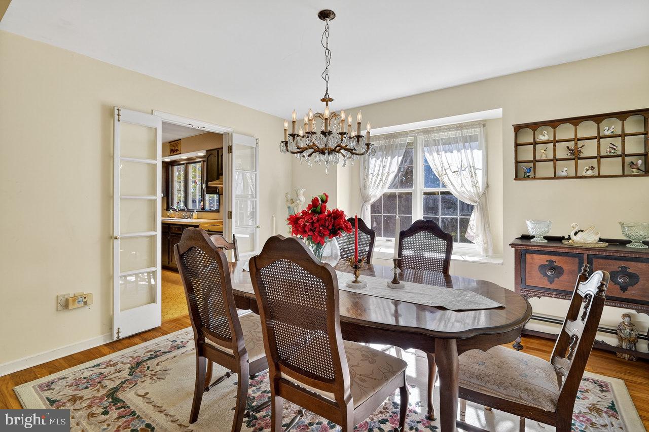 229 Lambertville Headquarters Road Stockton, NJ 08559 - Photo 16 of 44 a view of a dining room with furniture and chandelier