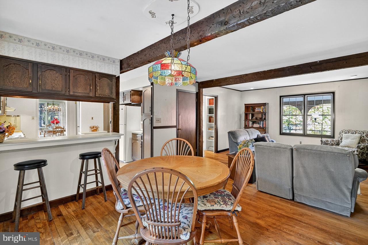 229 Lambertville Headquarters Road Stockton, NJ 08559 - Photo 22 of 44 a view of a dining room with furniture window and wooden floor