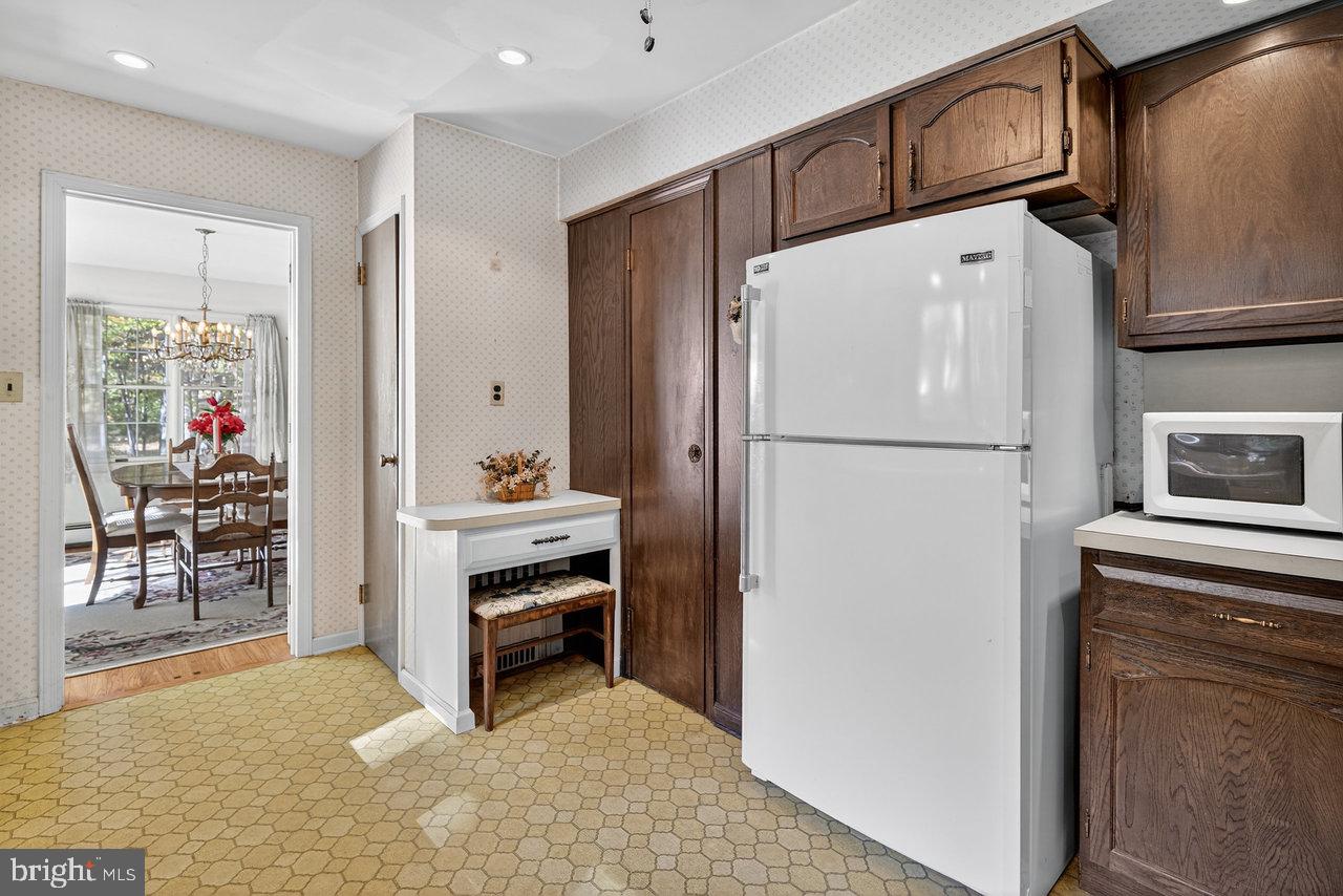 229 Lambertville Headquarters Road Stockton, NJ 08559 - Photo 25 of 44 a kitchen with stainless steel appliances a refrigerator and a stove top oven