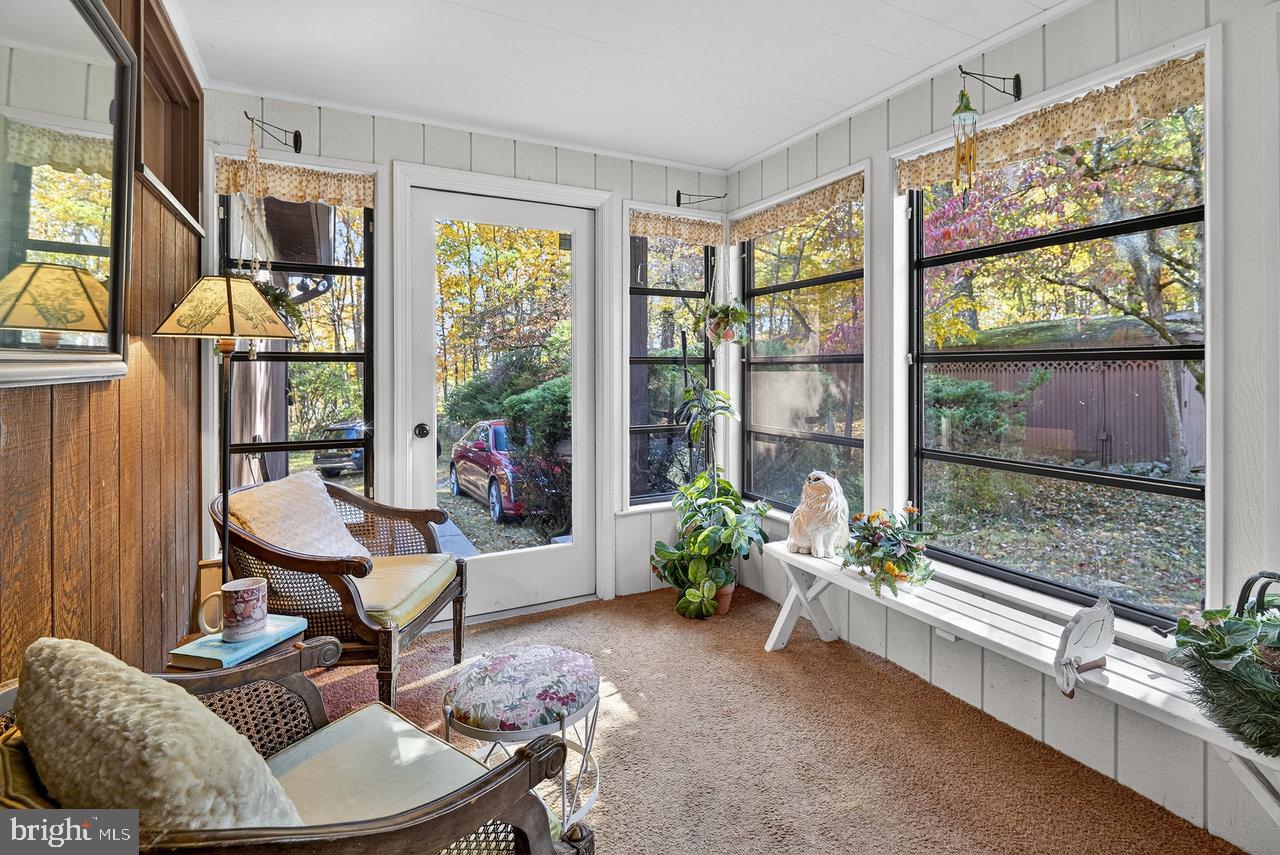 229 Lambertville Headquarters Road Stockton, NJ 08559 - Photo 26 of 44 a living room with furniture and a potted plant