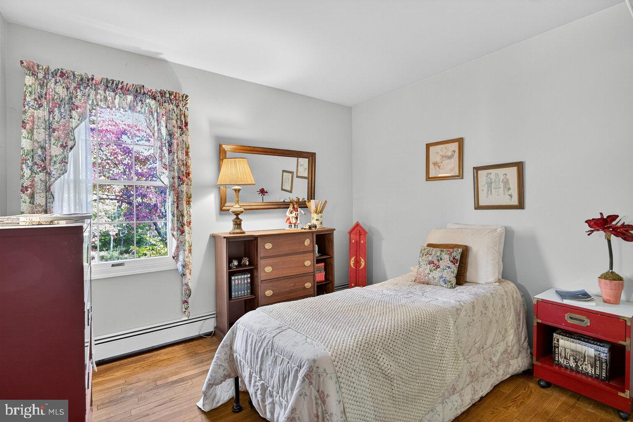 229 Lambertville Headquarters Road Stockton, NJ 08559 - Photo 28 of 44 a bedroom with a bed and a dresser