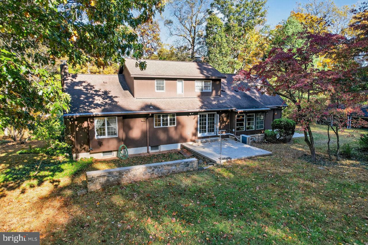 229 Lambertville Headquarters Road Stockton, NJ 08559 - Photo 40 of 44 a view of a house with backyard and sitting area