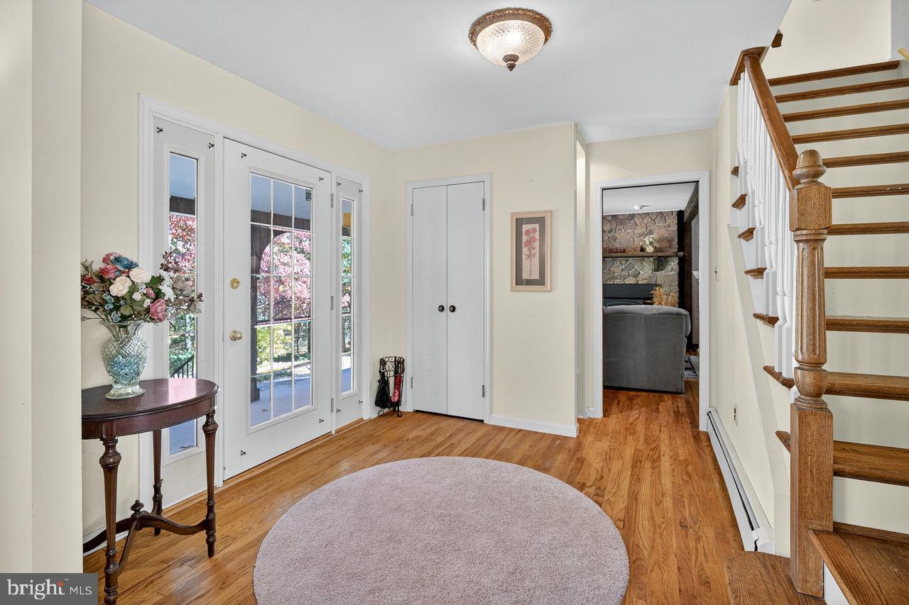 229 Lambertville Headquarters Road Stockton, NJ 08559 - Photo 9 of 44 a bedroom with furniture and a wooden floor