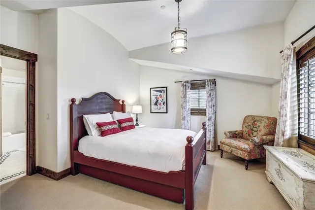 a bedroom with a bed and furniture