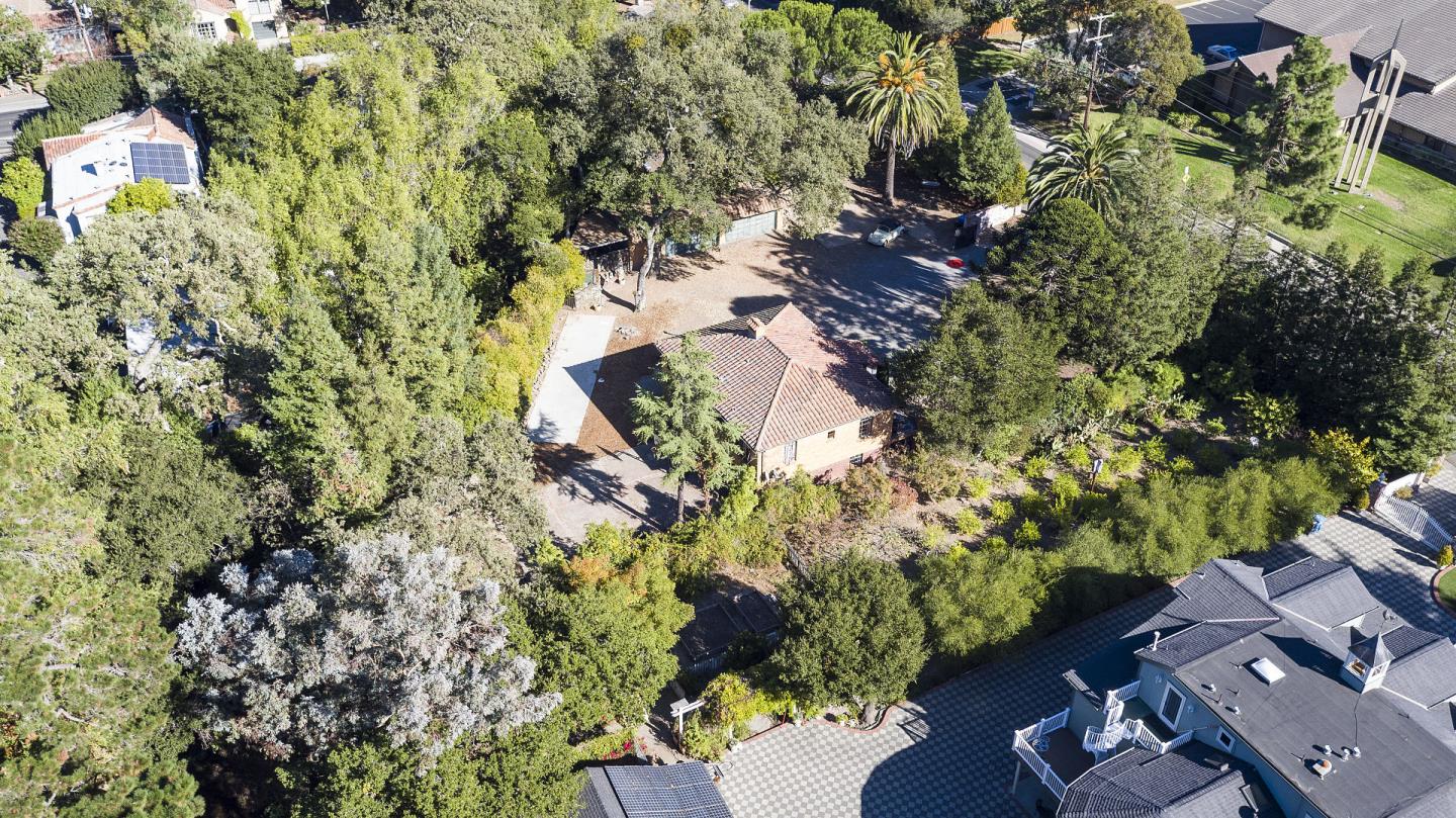 1438 Edgewood Road Redwood City, CA 94062 - Photo 8 of 9 an aerial view of a house with a yard