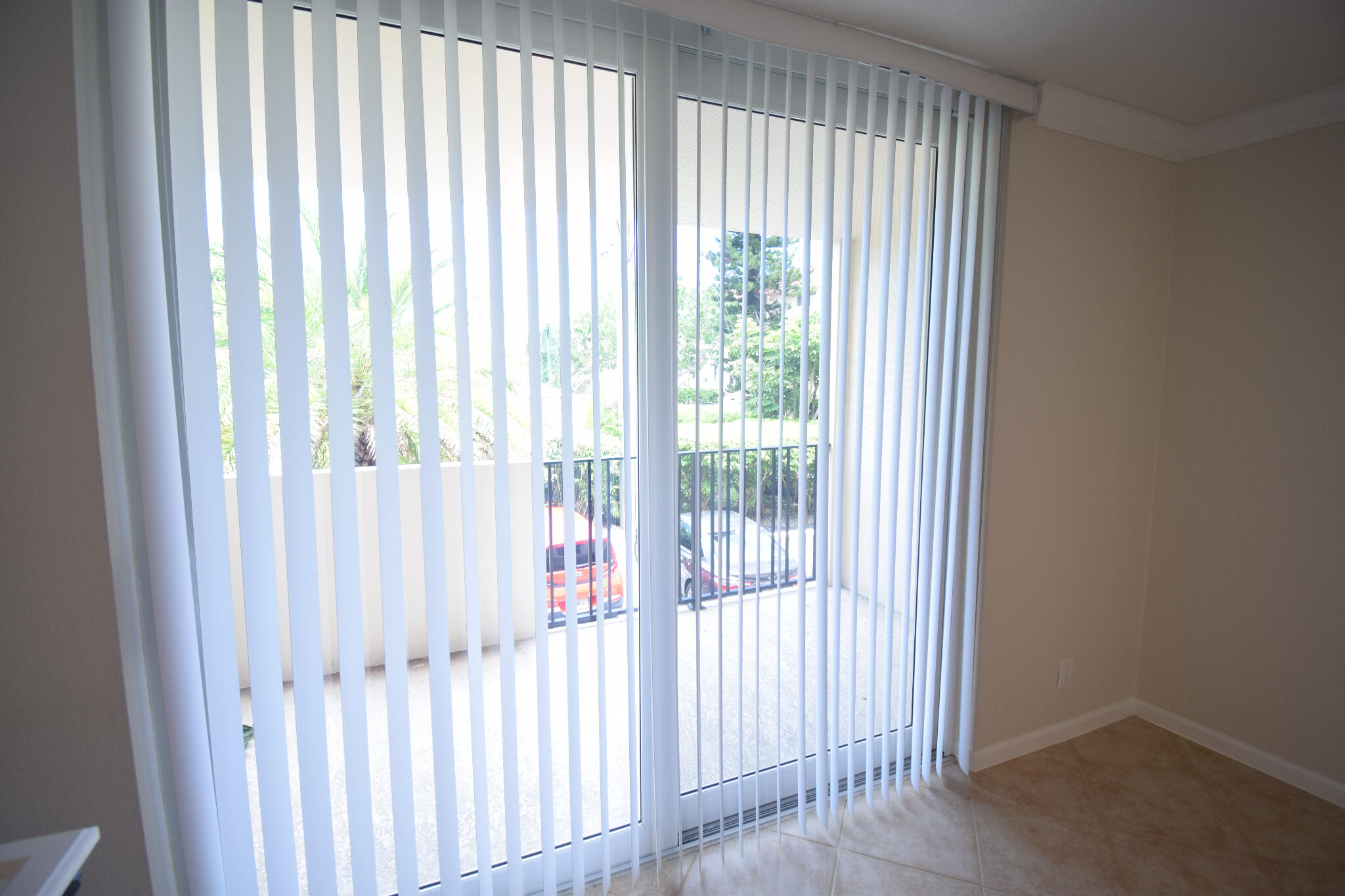1000 Spanish River Road, Unit 2K Boca Raton, FL 33432 - Photo 24 of 26 a view of a porch with a chair