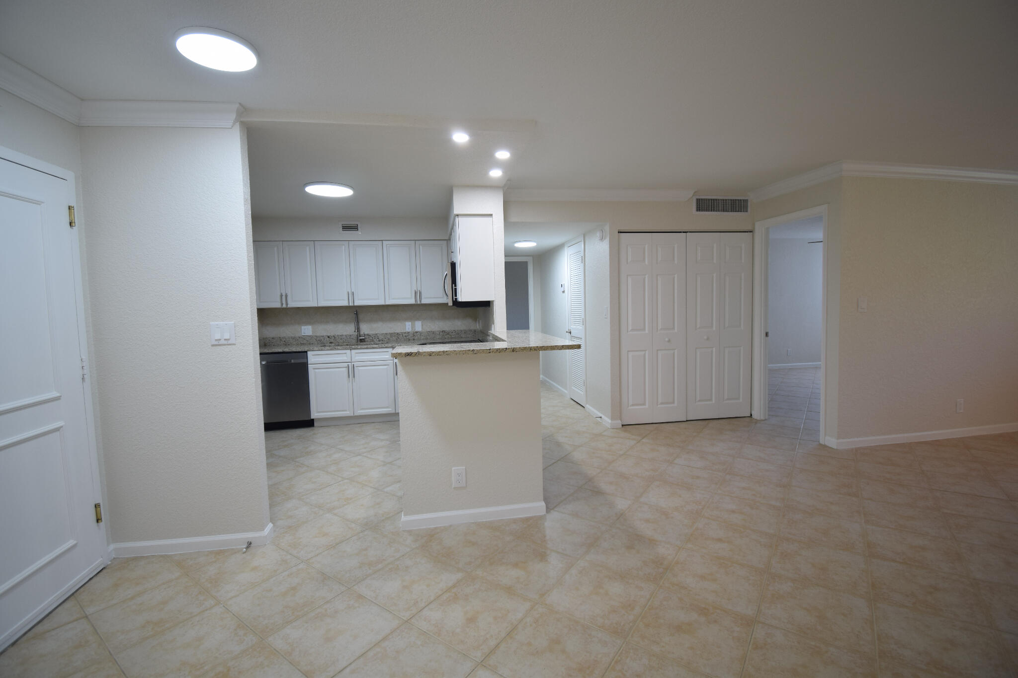 1000 Spanish River Road, Unit 2K Boca Raton, FL 33432 - Photo 8 of 26 a view of a kitchen with a sink