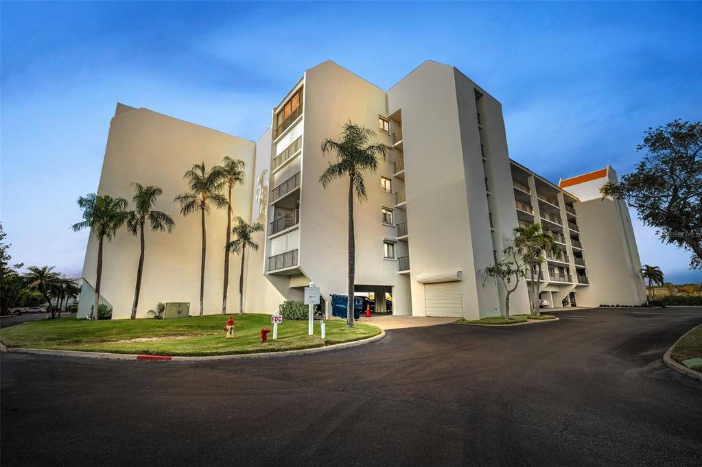 19111 Vista Bay Drive, Unit 211 Indian Shores, FL 33785 - Photo 1 of 62 a view of a park with a tall tree