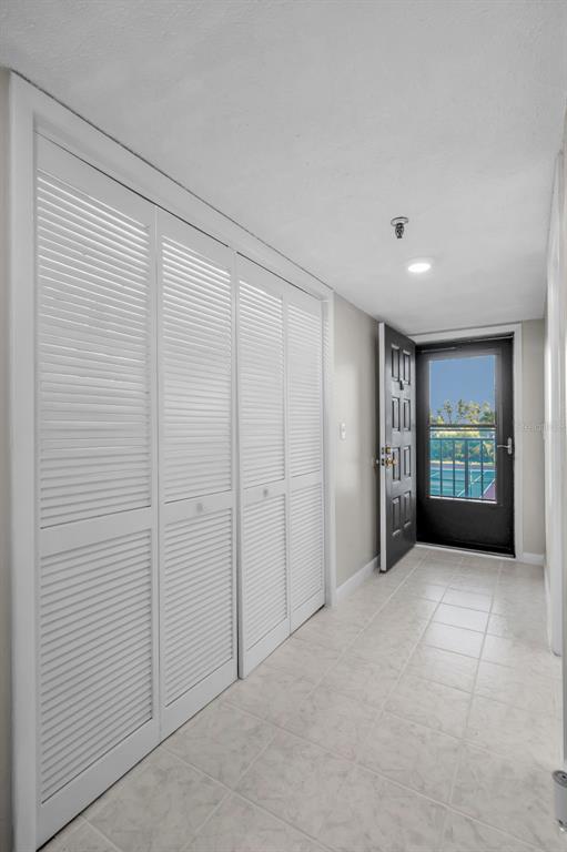 19111 Vista Bay Drive, Unit 211 Indian Shores, FL 33785 - Photo 11 of 62 a view of an empty room with a window