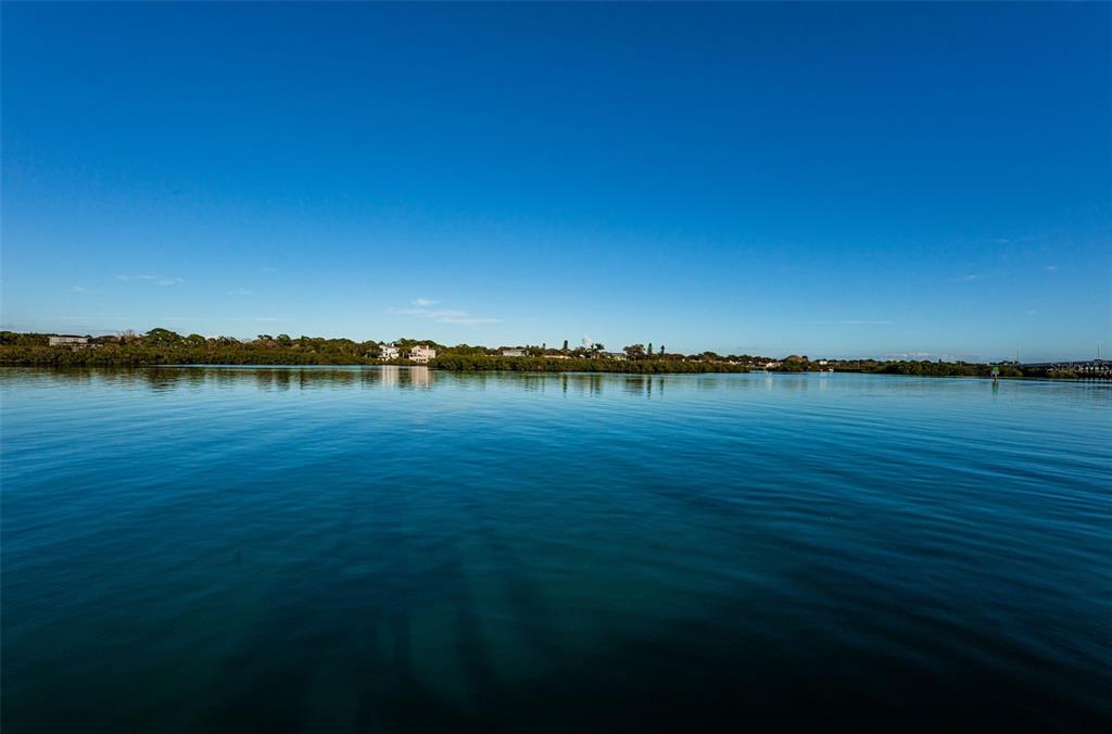 19111 Vista Bay Drive, Unit 211 Indian Shores, FL 33785 - Photo 45 of 62 a view of a lake with houses in the background