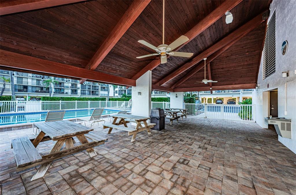 19111 Vista Bay Drive, Unit 211 Indian Shores, FL 33785 - Photo 51 of 62 a view of a backyard with sitting area