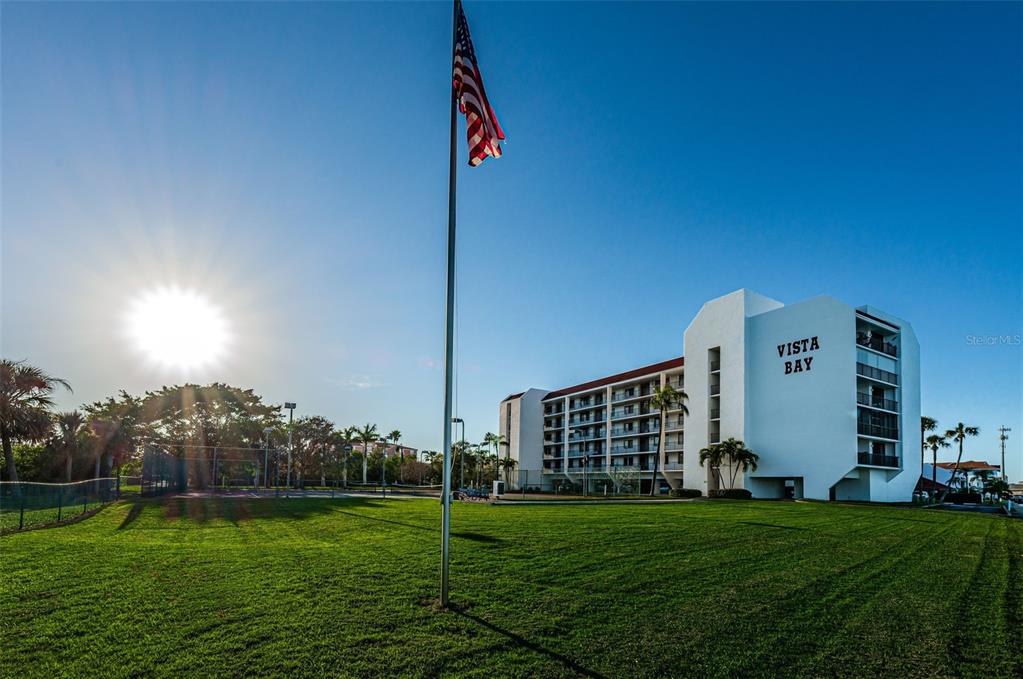 19111 Vista Bay Drive, Unit 211 Indian Shores, FL 33785 - Photo 57 of 62 a view of a building and a yard