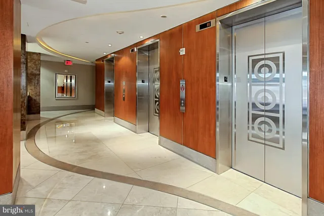 a view of a hallway with bathroom