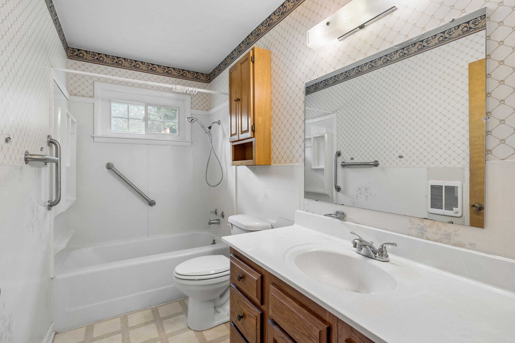 708 Hickory Street Centerville, TN 37033 - Photo 22 of 57 a bathroom with a granite countertop sink toilet and shower