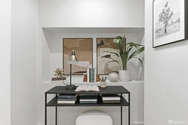 a dining room with furniture and wooden floor